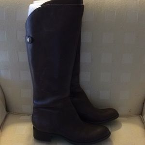 Knee high leather boots with zipper back